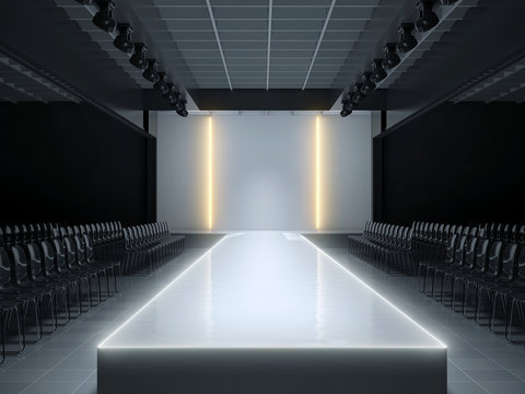 Fashion show runway with stage lights and audience seating